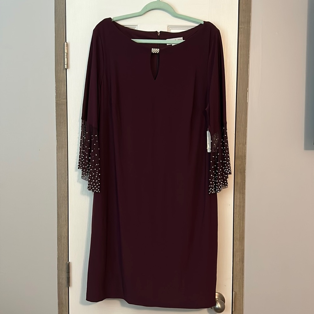 Beautiful deep purple dress NWT, this would be a great addition to any wardrobe!